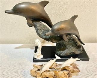 Dolphin figurines.