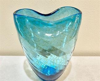 Beautiful contemporary blue glass vase with gold lines.