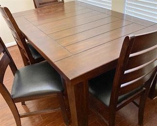 Dining Room table, 4 chairs with bench, table leaf.