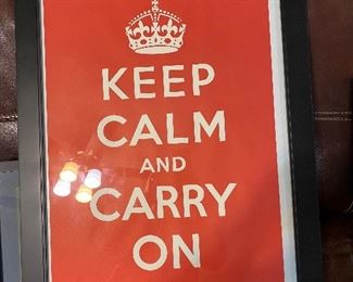 Framed replica of WWII poster, "Keep Calm and Carry On".  Measures 21" x 27".