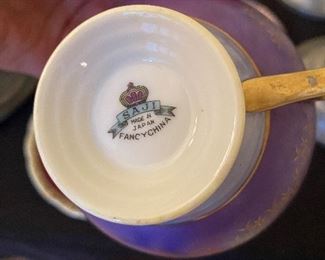 Purple Cup & Saucer - Saji. Asking $15.