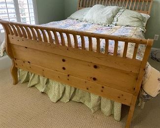 (F21) Queen size Pine Bed frame.  Frame is 65" wide.  Footboard is 36" tall. Headboard is 47" tall. Pine frame is in like new condition! Asking $300. (mattress and box spring not included)