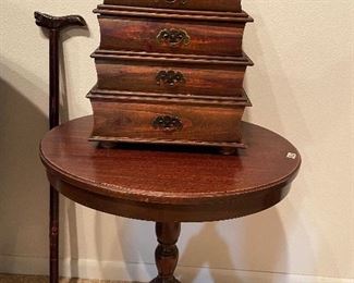 Antique table with stacked drawers