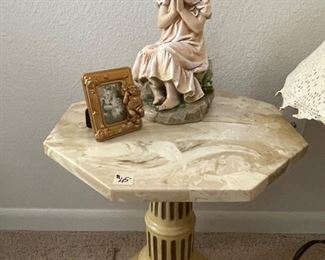 Marble table with figurine