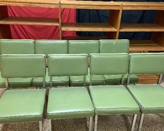 8 green vinyl/ metal chairs
