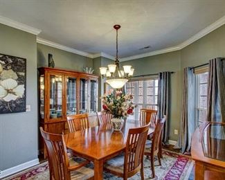 Thomasville dining room with table, 6 chairs, buffet and china cabinet.  Beautiful 8 x 10 rug.