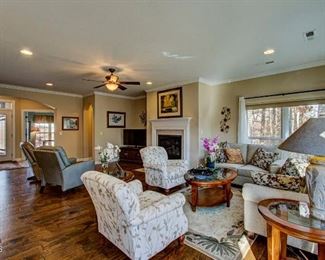 Two accent chairs, matching lamps, 3 end tables and coffee table all matching, 8 x 10 rug.