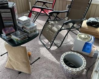 Zero gravity chairs, lots of cds.