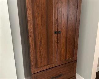 Narrow armoire.