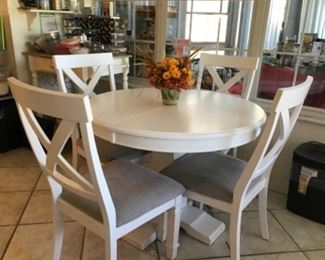 Pedestal Table with  Upholstered Chairs.  Like New! Dimensions: 42" with 12" leaf removed