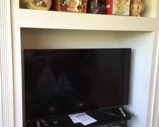 small older TV, decor items
