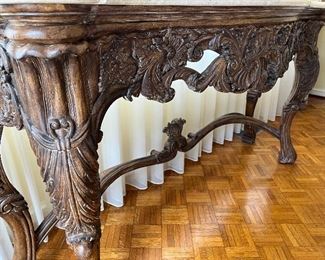 Marble topped elaborate wooden based French console accent table (66"W x 20"D x 34"H) 