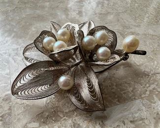 Sterling silver with pearl broches