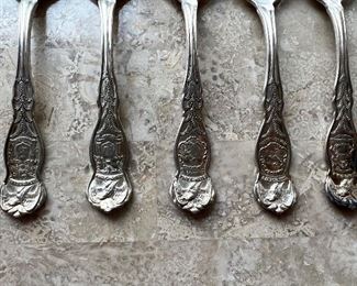 Antique state named silver plate spoons (10pc)