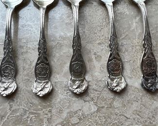 Antique state named silver plate spoons (10pc)