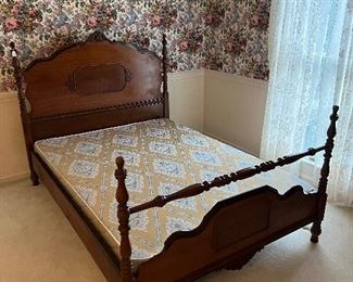 Antique full sized poster bed with detail