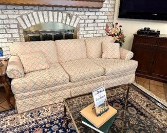 Custom upholstered sofa...clean as new and ready for you to curl up on!