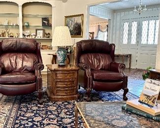 Hancock and Moore leather recliner. Top grain leather, wingback, nail-head trim, ball & claw feet.