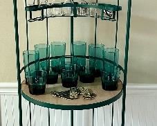 Iron and wood three shelf bar with wine rack