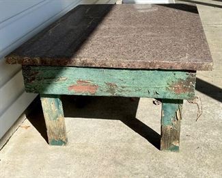 Primitive table with stone top