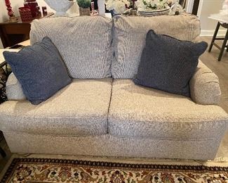 Pair of neutral 2 cushion sofas - 65” wide