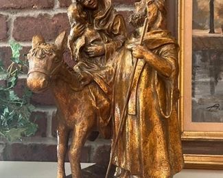 Flight to Egypt, gold painted resin statue