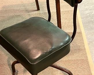 Vintage green leather shop chair