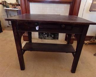 Dark wood parlor table