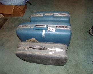 Retro Royal Traveler suitcases and one American Tourister