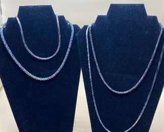 Four Silver Toned Chained Necklaces