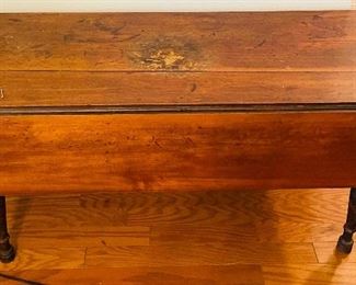$195 
Antique primitive coffee table 48Lx19W + 2 leaves 10 1/2"
Damage at center / crack on center plank 