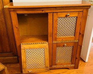 $250 
Handcrafted small cabinet with brass accents 36 1/2Hx36Lx11D