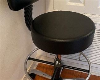 $70 
Tall swivel chair on caster, faux leather round seat 