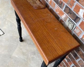 $50 
Skinny table wood and black legs 30Lx30Tx12W