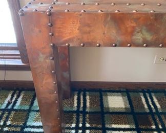 Custom riveted brass console table
