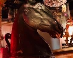 Huge fiberglass knight chess piece.