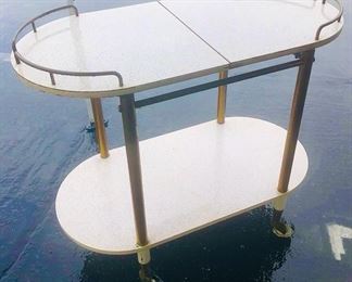 1970s glitter wheel about bar cart.