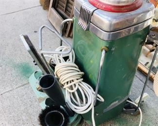 1960s airway vacuum with attachments.