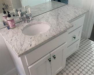 Marble top bathroom vanity includes sink 