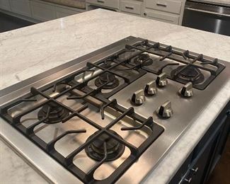 Stainless steel five burner cooktop