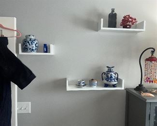 three shelves and some decor