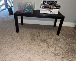 coffee table and action figures and models
