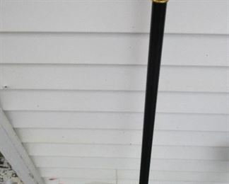 MASONIC BLACK CANE W/GOLD TONE HANDLE 36" TALL WITH  MASONIC EMBLEM ON TOP - HANDLE UNSCREWS TO REVEAL A  HIDDEN DAGGER 15" LONG    $50
