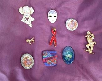 9  COSTUME BROOCHES      $5