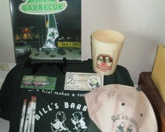 LOT OF MEMORIBILIA FROM  "BILL'S BARBECUE" ,A RICHMOND TRADITION FOR 82 YEARS.  LOT INCLUDES A CUP, TEE-SHIRT, LOGO HAT, PENCILS, METAL CLASSIC CAR PLAQUES, AN OLD GIFT CERTIFICATE AND A PHOTO OF THE SIGN AT THE 927 MYERS ST. LOCATION.      $45 