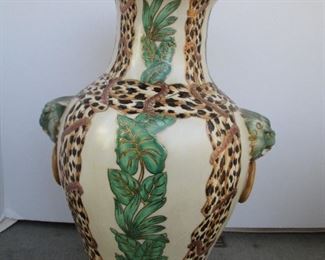 LARGE VASE  15" TALL W/ LION HEAD HANDLES AND A  LEOPARD MOTIF.    $10