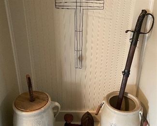 several churns, old irons, reproduction CSA sword