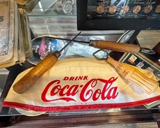 Coca Cola hat, ice picks, bottle opener