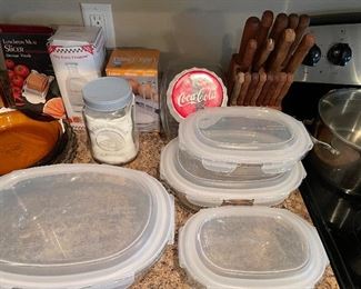 covered baking dishes, set of knifes, Coca Cola cannister.