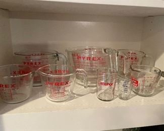 lots of glass Pyrex measuring cups